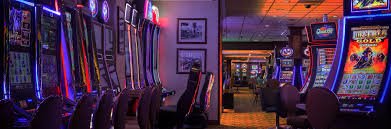 roamer live-dealer studio with blackjack and roulette tables